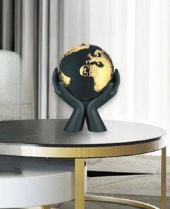 Scultura mondo nelle mani nero oro h13 soprammobile bongelli preziosi