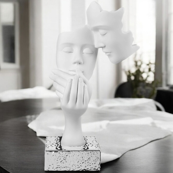 Bongelli preziosi scultura moderna volti face bianco argento